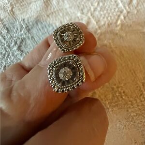 Diamond earrings set in Sterling Silver. 
For pierced Earrings.